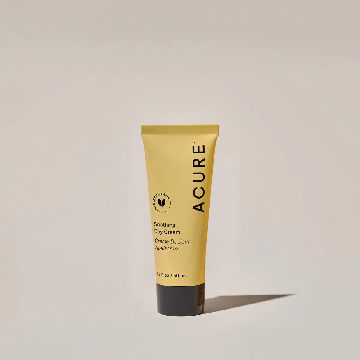 Acure Soothing Day Cream tube on white background