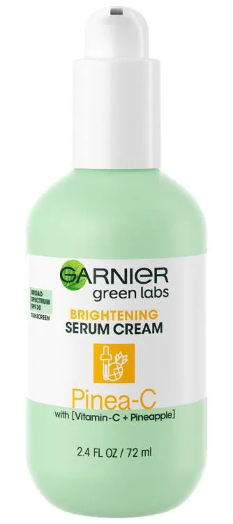 Garnier Green Labs Pinea-C Brightening Serum Cream SPF 30 in white pump bottle with yellow accent