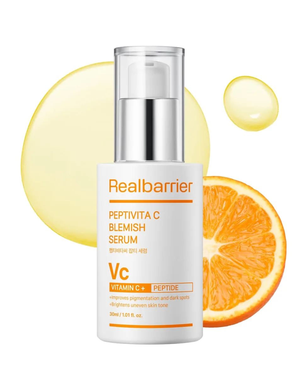 Real Barrier Peptivita C Blemish Serum white 30 ml pump bottle with orange lettering beside a sliced orange