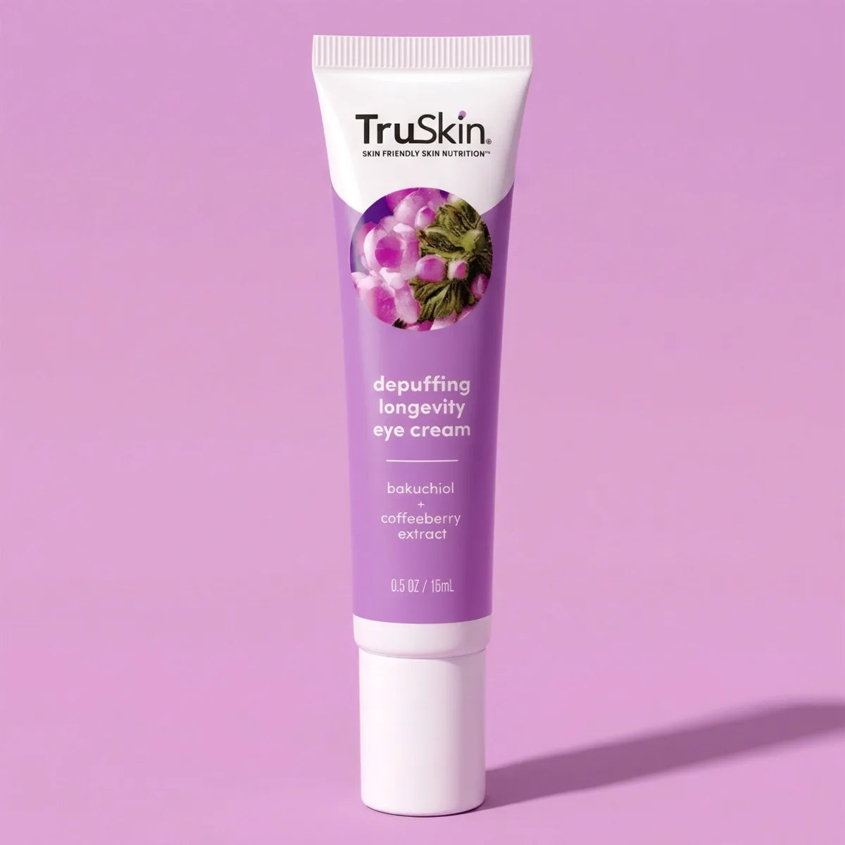 TruSkin Depuffing Longevity Eye Cream in a white and purple squeeze tube labelled bakuchiol and coffeeberry extract